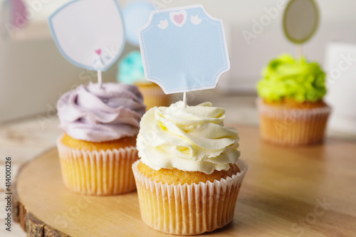 Tasty cupcakes with stylish...