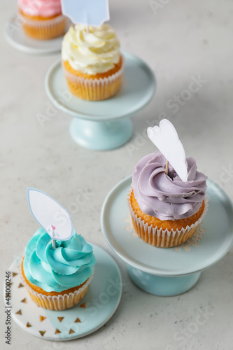 Tasty cupcakes with stylish...