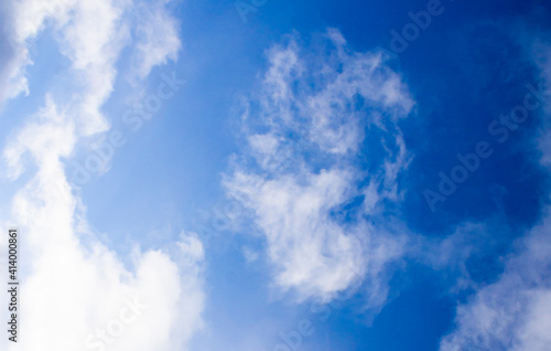 Blue cold sky with white clouds
