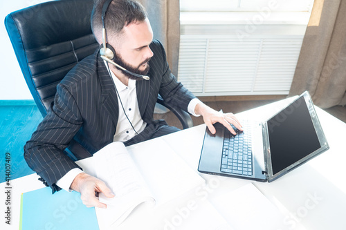 Consulting by phone. A man ...