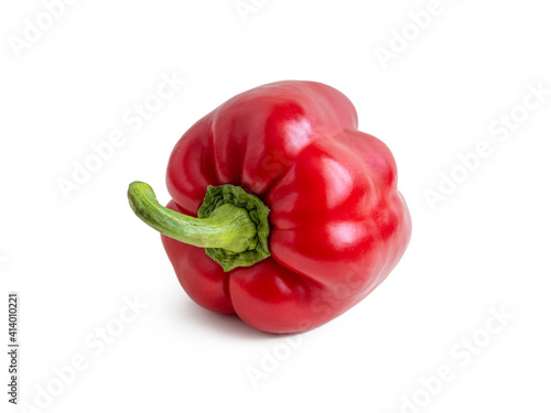 Red ripe bell pepper on a white background