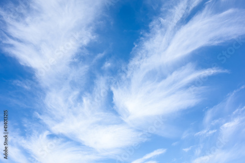 Blue sky with white clouds to be used as a background.