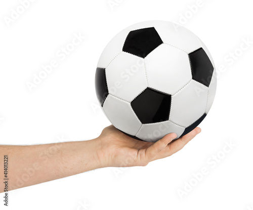 Hand and soccer ball