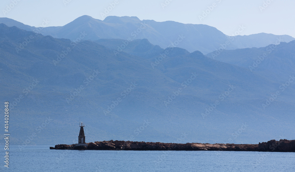 A Lighthouse with sea background and a huge mountain Velebit A Lighthouse with sea background and a huge mountain Velebit