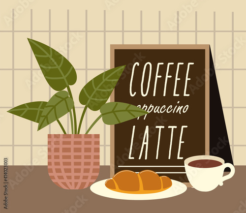 coffee shop cup croissant sign board and plant