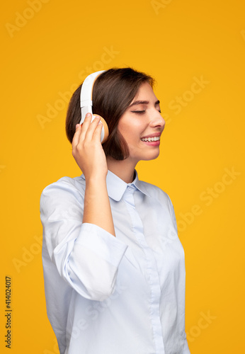 Glad woman listening to music