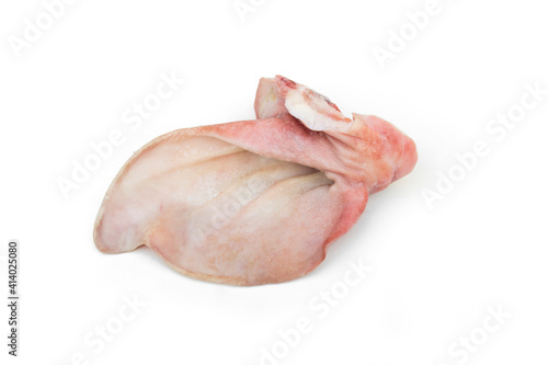 Fresh pig ears on a white background.