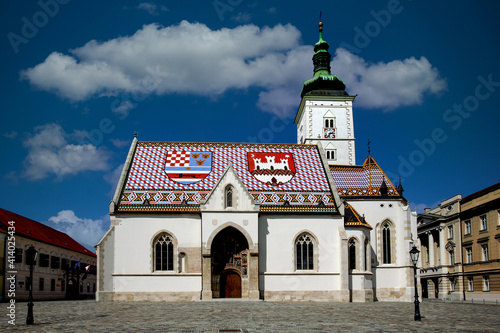 Church of Saint Marko in Zagreb, Croatia, with blue skies and white clouds in the Background