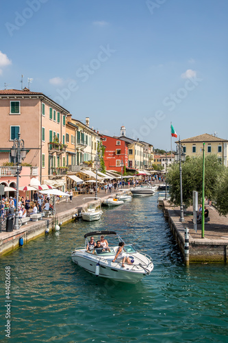 Sirmione on Lake Garda. Pier  embankment  canal with boats. Sirmione  Lombardy  Italy