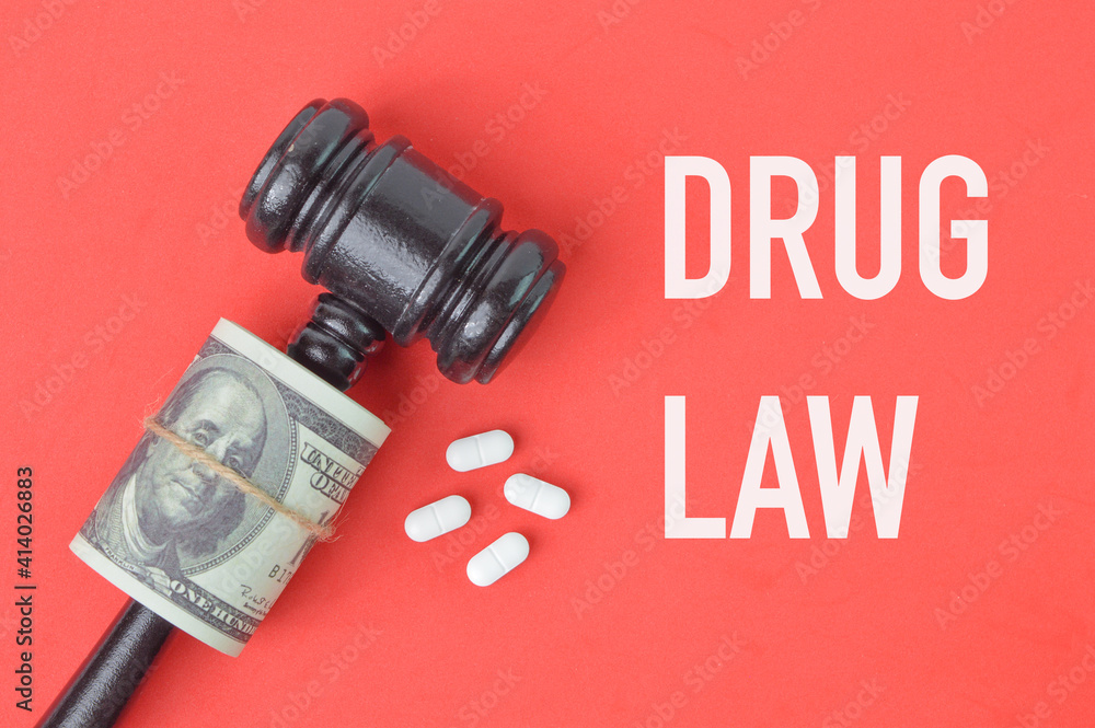 Red background written with text DRUG LAW.