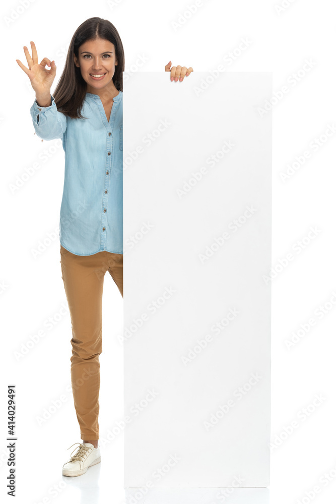 beautiful casual woman giving a thumbs up beautiful casual woman giving a thumbs up