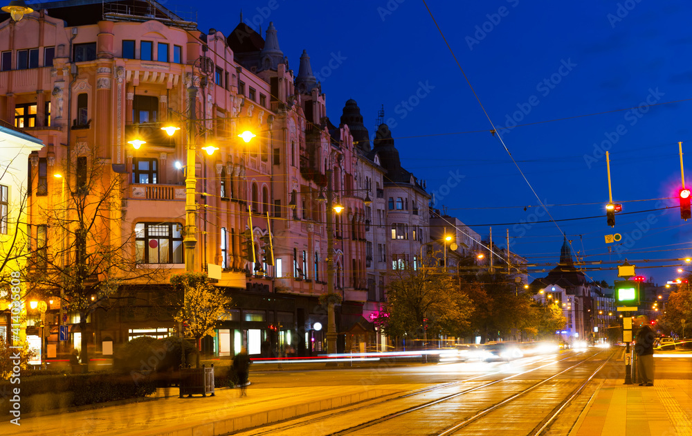 Fototapeta premium Nightlife of illuminated central Debrecen streets, Hungary