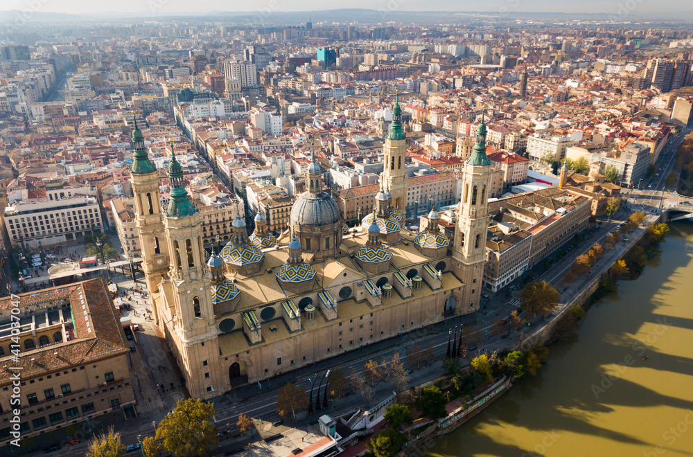 Aerial view of Roman Catholic Basilica Our Lady of Pillar on background of Zaragoza cityscape and Ebro river, Spain