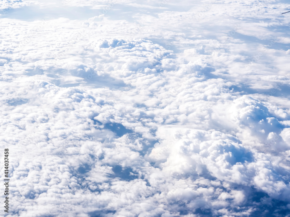 Above the cloud, sky view from airplane window. Above the cloud, sky view from airplane window.