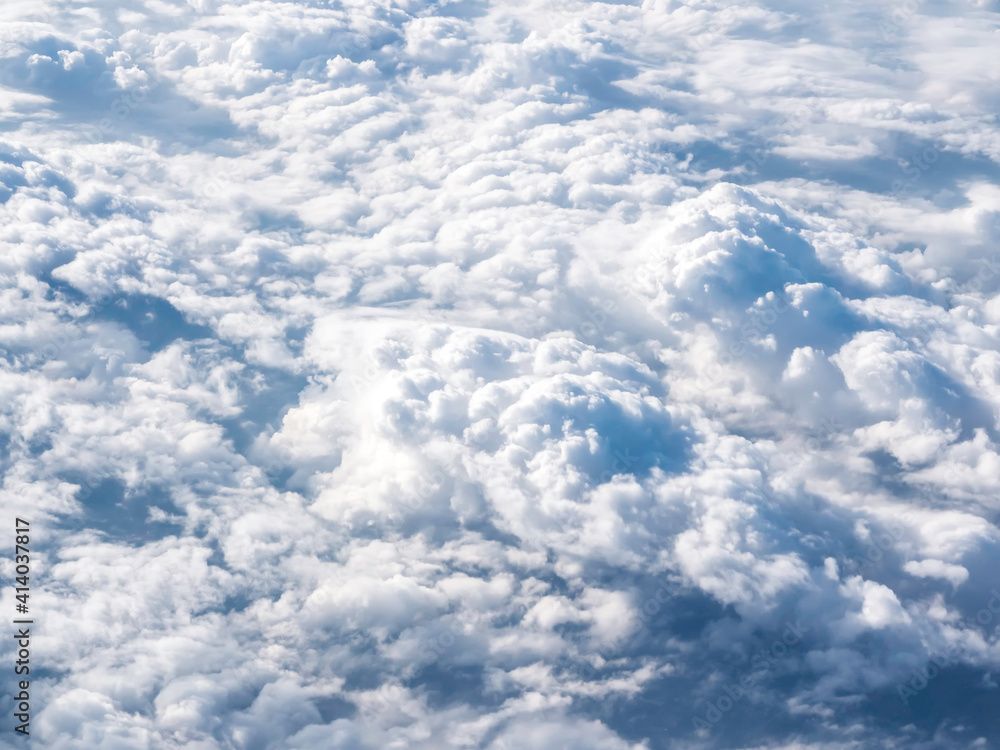 Above the cloud, sky view from airplane window. Above the cloud, sky view from airplane window.