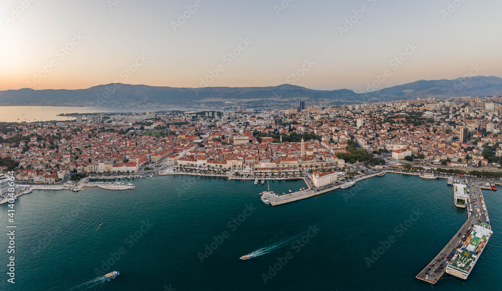 Aerial drone shot of old town port riva in sunset hour in Split croatia