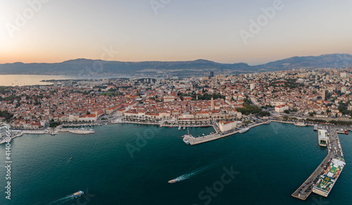 Aerial drone shot of old town port riva in sunset hour in Split croatia