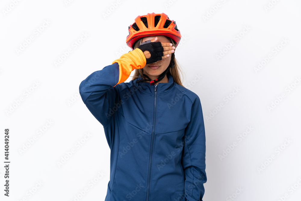 Young hispanic cyclist woman isolated on white background covering eyes by hands. Do not want to see something Young hispanic cyclist woman isolated on white background covering eyes by hands. Do not want to see something