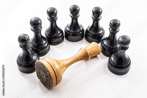 queen and pawn. falling old dictator surrounded by young generation - youth bulge above old formations - regime change chess metaphor