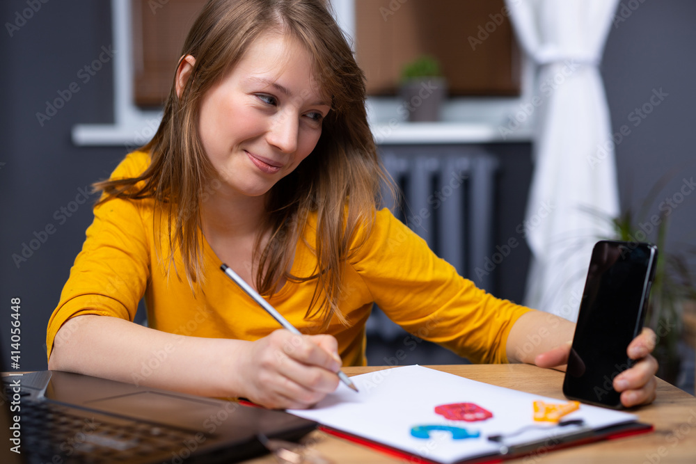 Young Woman Working from Home as a Online Support. Online English Language Classes. Working remotely Young Woman Working from Home as a Online Support. Online English Language Classes. Working remotely