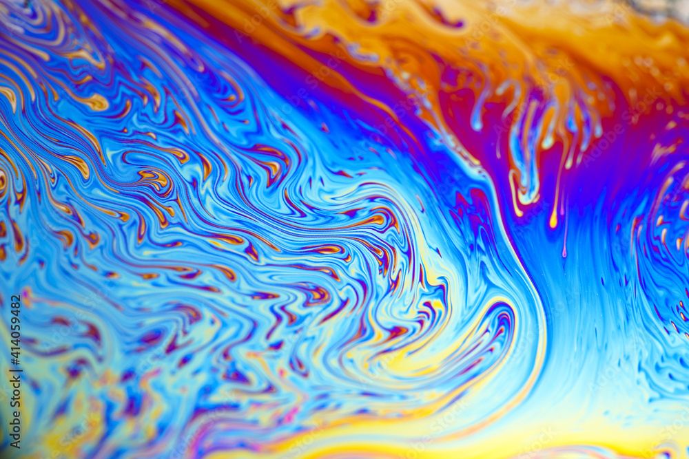 Colorful soap bubbles, iridescent liquid Colorful soap bubbles, iridescent liquid