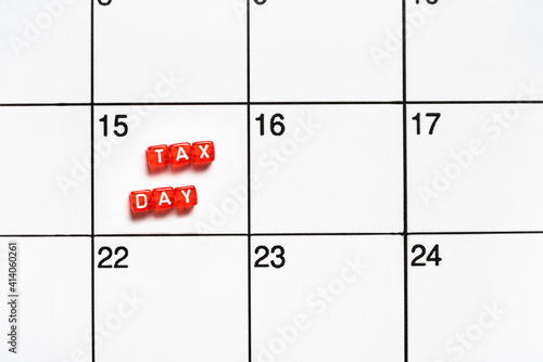 Tax day deadline reminder on April 15 on calendar.