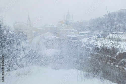View of the Kyiv downtown, "Andriyivskyi Uzviz" street, in snowy winter weather © Alexandra Lande