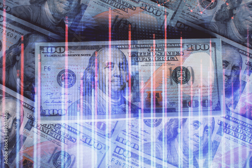 Multi exposure of forex chart drawing over us dollars bill background. Concept of financial success markets. © peshkova