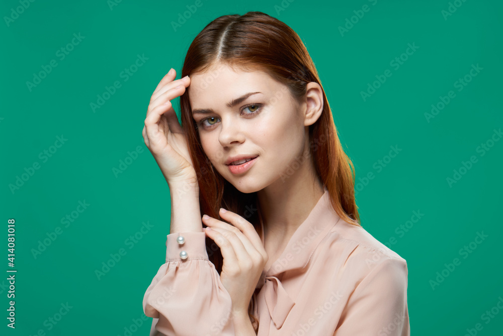 cheerful woman pink shirt emotions hand gestures close-up green background cheerful woman pink shirt emotions hand gestures close-up green background