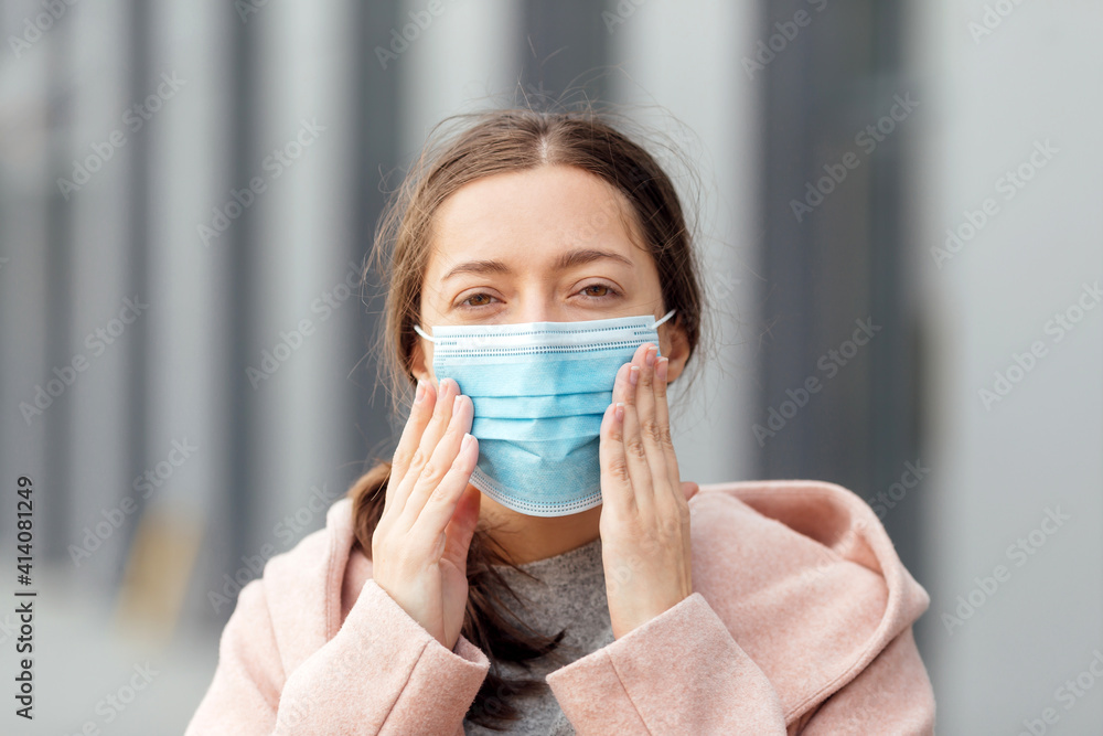 COVID-19 Pandemic Coronavirus Woman in city street wearing face mask protective for spreading of disease virus SARS-CoV-2 COVID-19 Pandemic Coronavirus Woman in city street wearing face mask protective for spreading of disease virus SARS-CoV-2