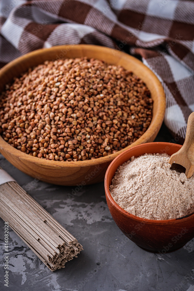 fresh natural buckwheat flour on a dark stone background culinary concept fresh natural buckwheat flour on a dark stone background culinary concept