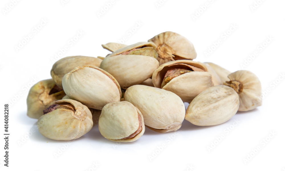 Pistachio nuts. Isolated on a white background Pistachio nuts. Isolated on a white background