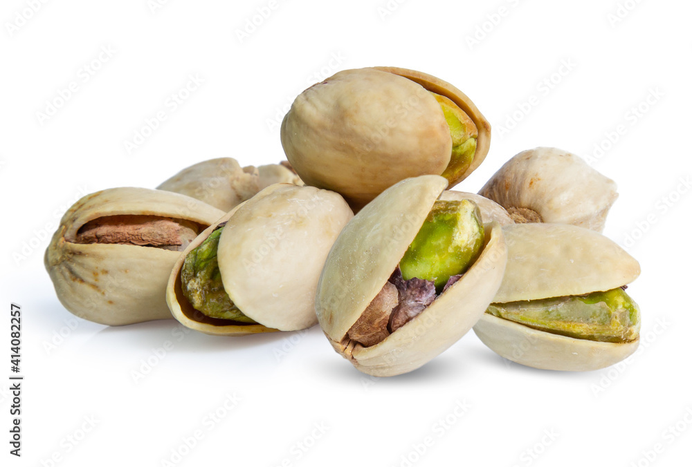 Pistachio nuts. Isolated on a white background Pistachio nuts. Isolated on a white background