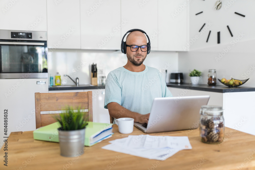 Man working from home during the coronavirus pandemic Man working from home during the coronavirus pandemic