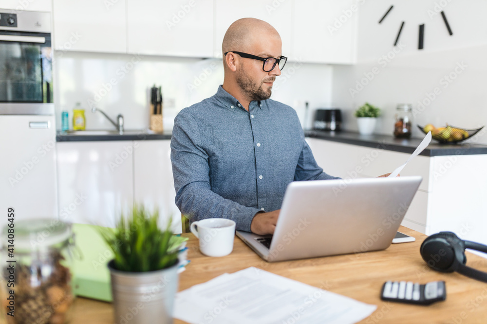 Man working from home during the coronavirus pandemic Man working from home during the coronavirus pandemic
