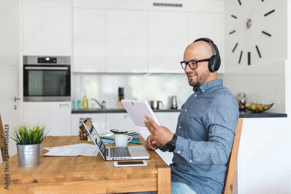 Man working from home during the coronavirus pandemic Man working from home during the coronavirus pandemic