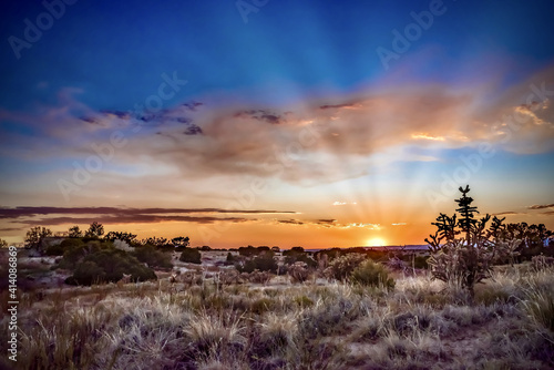 Beautiful sunset over a field in Santa Fe, New Mexico photo
