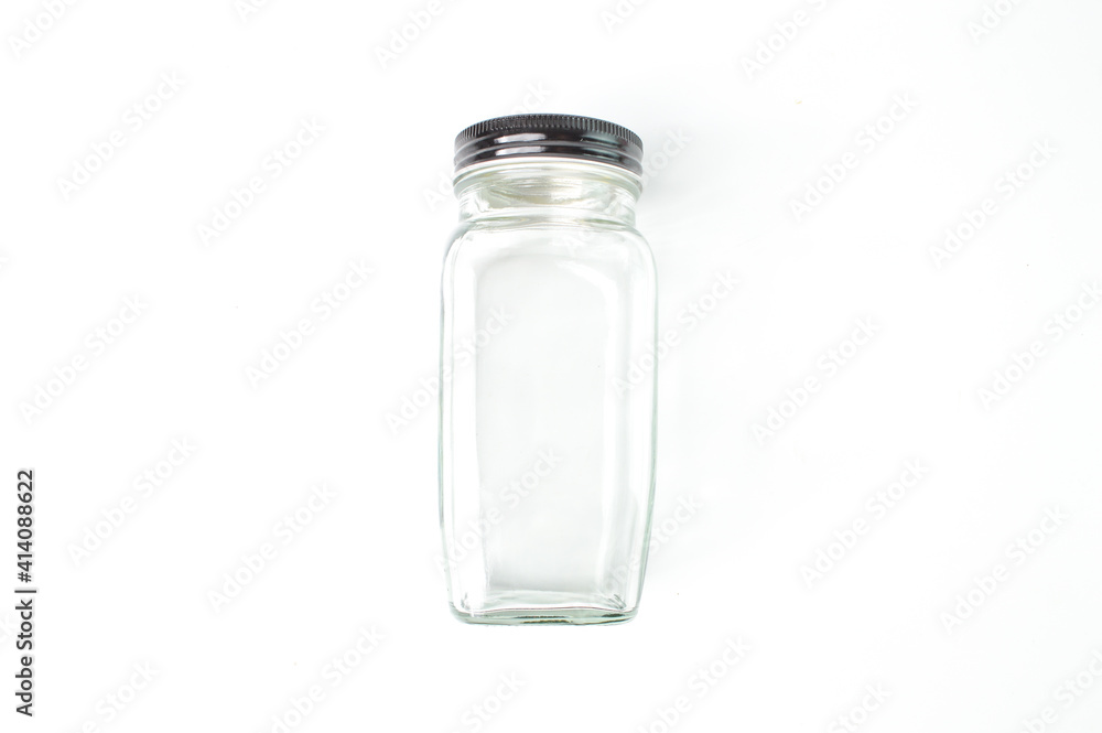 Empty glass jar over white background. Empty glass jar over white background.