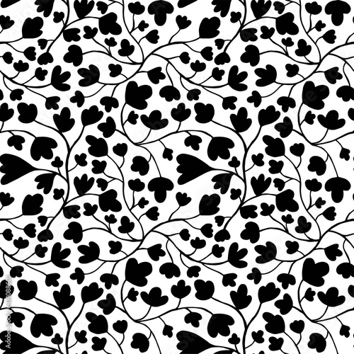 Tangled field flowers black and white seamless pattern stock vector illustration. Monochrome chaotic floral complex pattern for surface design. Summer and spring wild herbs black silhouette on white