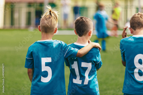 Soccer Boys Teammates. Friendship in a School Sports Team. Happy Kids Standing Together and Watching Football Match
