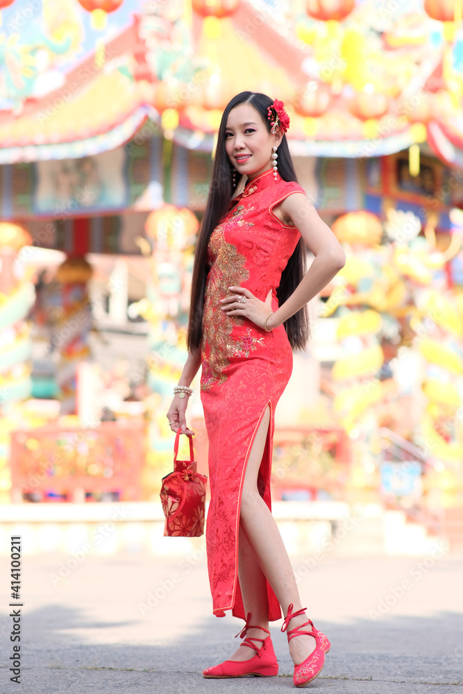 Portrait of asian woman in the chinese dress and Chinese new year concept
