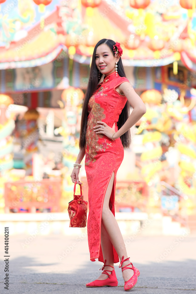 Portrait of asian woman in the chinese dress and Chinese new year concept Portrait of asian woman in the chinese dress and Chinese new year concept
