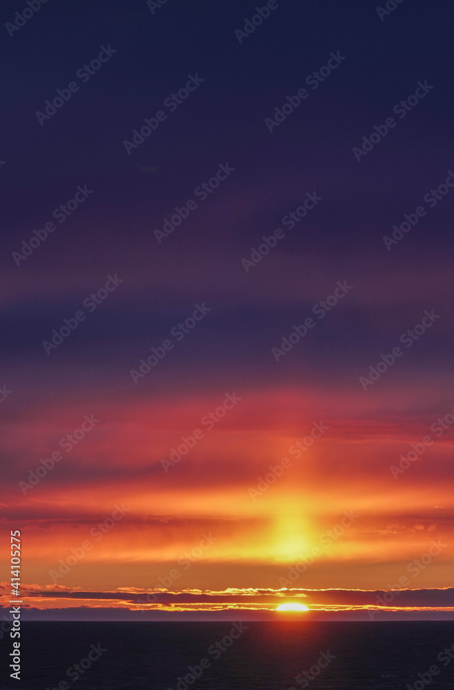 sunset over the sea portrait