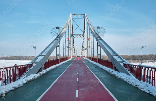 Pedestrian bridge in winter in Kyiv.