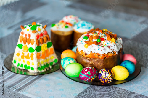 Traditional Easter holiday table served with Easter cake and eggs