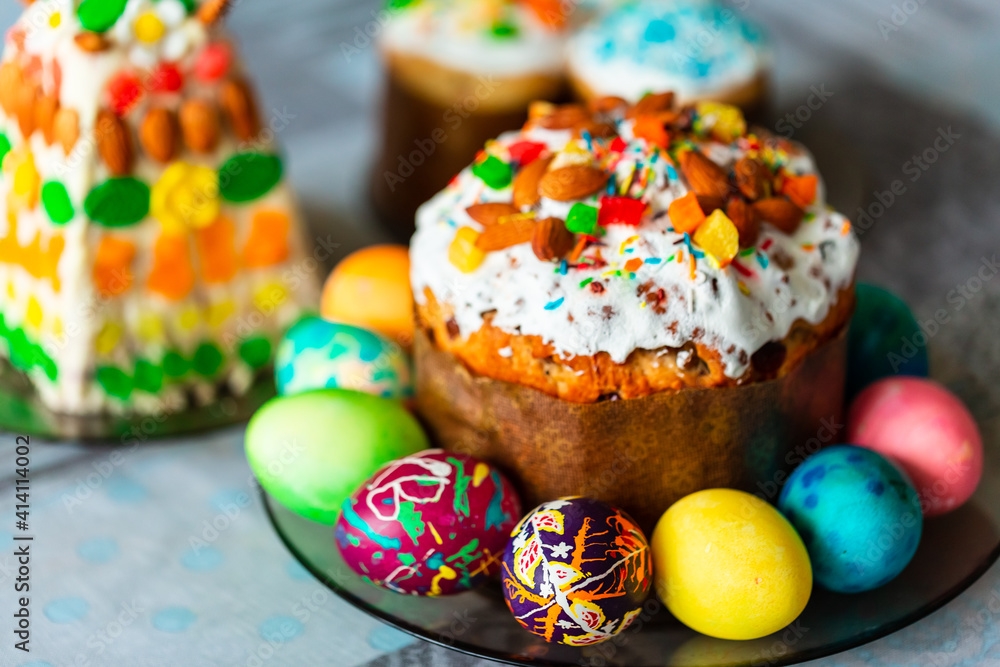 Traditional Easter holiday table served with Easter cake and eggs Traditional Easter holiday table served with Easter cake and eggs