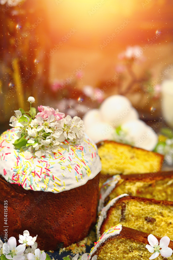 Happy Easter! Easter sweet dessert cake. Homemade baking. The decor is apple-tree flowers. Sun rays, boke and flash background. Magic and wonders for Easter. Copy space
