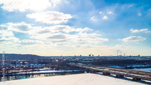 View of the snow-covered skyline of Duisburg on a sunny winter day from above © Julia Hermann