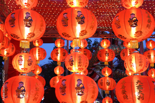 Photography Chinese red lanterns hanging in street at night during the Chinese New Year