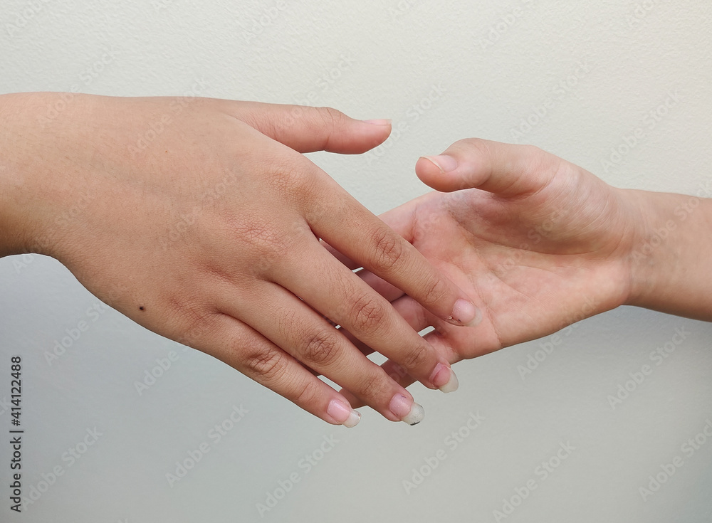 close up of hands holding hands close up of hands holding hands